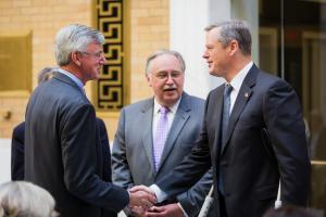 Bob Durand, Author of the Community Preservation Act, greets Governor Baker