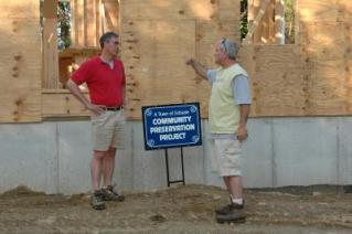 An affordable home being built in Scituate, with a Community Preservation Project sign out front.