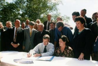 Gov. Cellucci signing CPA, Courtesy of Massachusetts Archives